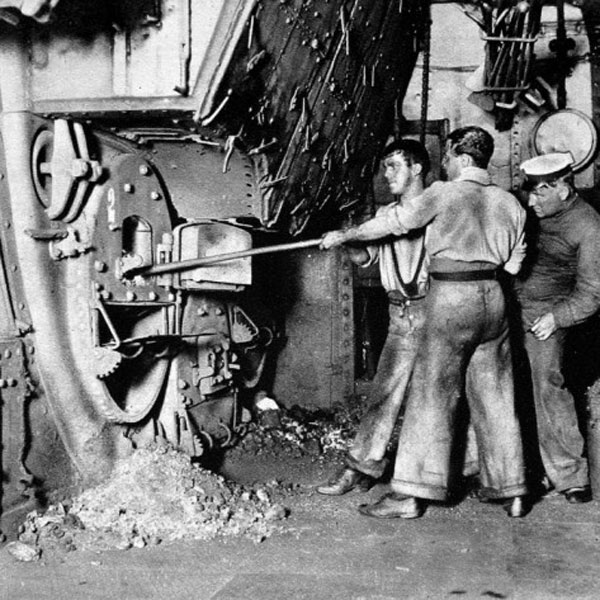 Photograph of firemen working in the stokehold of a British ship 1913.